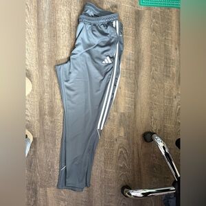 Adidas women’s Gray Track Pants with White Stripes, tapered bottom with zippers